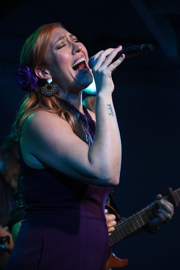 Tiffany Joy singing on stage