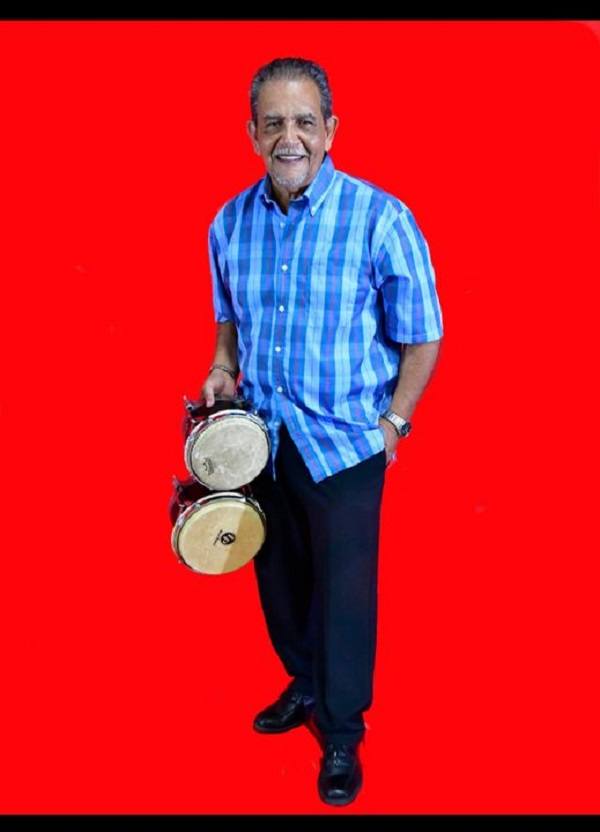 Founder of Son Latino De Orlando and bongo player Carlos Rodríguez