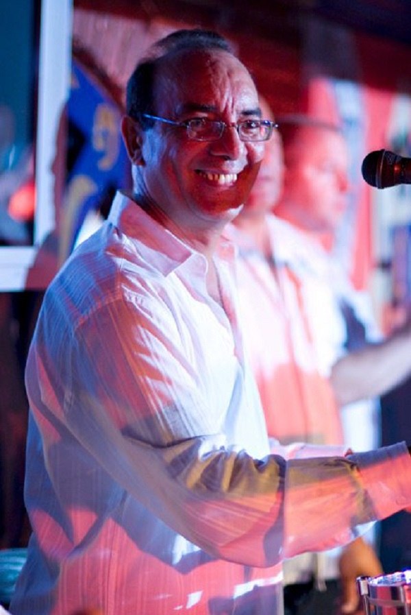 Carlos Navarro performing on stage