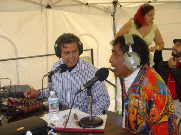 Host Eddie López and Venezuelan Latin music bandleader Rudy Regalado