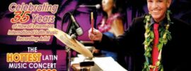 Rolando Sanchez playing drums in concert