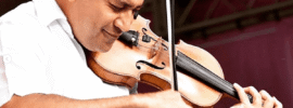 Ali playing the violin