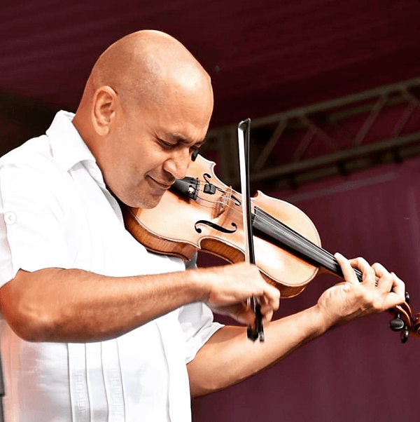 Ali playing the violin