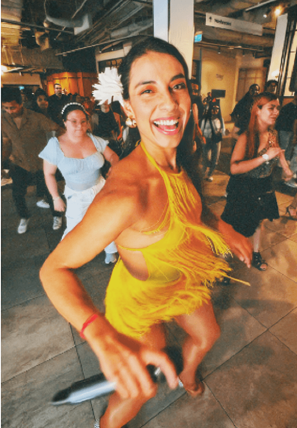 Camila dancing at an event