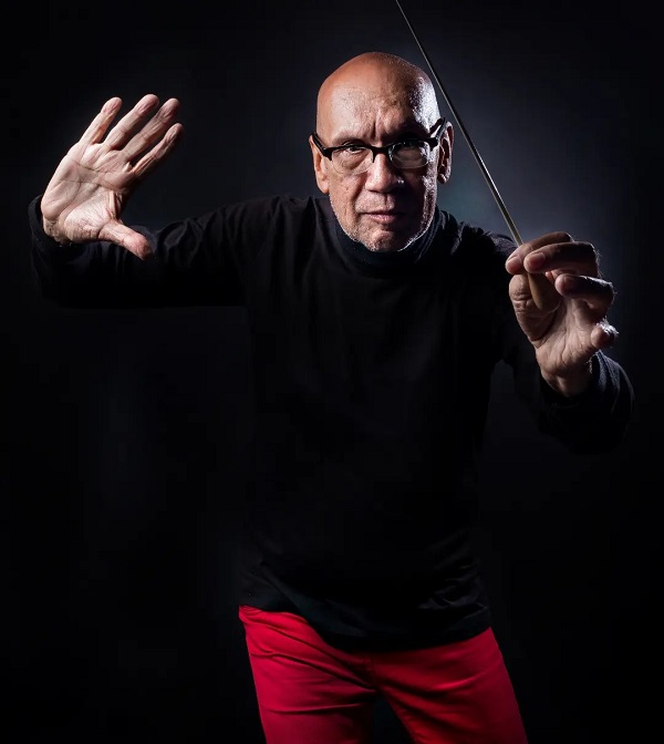 Nacido en Caracas, Venezuela, el 2 de enero de 1949, bajo el nombre de Nelson Valor Ramos