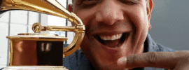 Tony Rosa with his Grammy