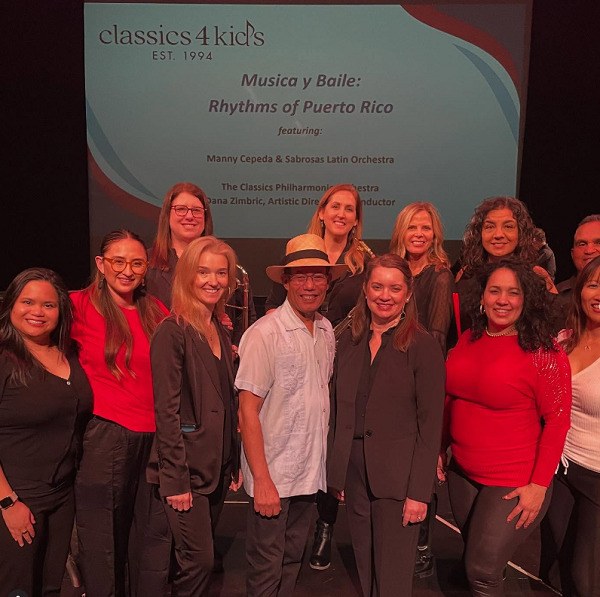 The members of Sabrosas Latin orchestra and Manny Cepeda
