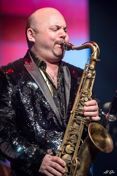 Yaacov Mayman playing the saxophone